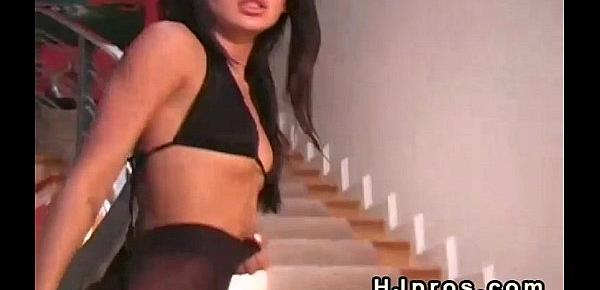  Exotic babe in sheer pantyhose posing on stairs